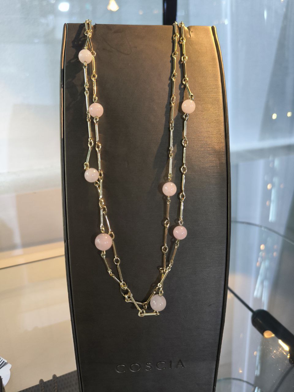 COLLANA DORATA
CON PIETRE ROSA