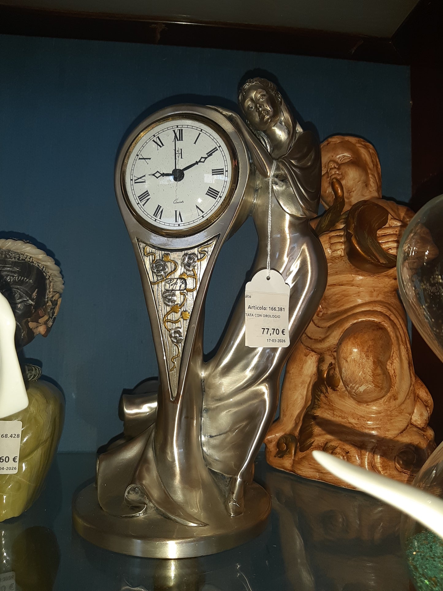 Statuetta Argentata Con Orologio Da Tavolo R.
